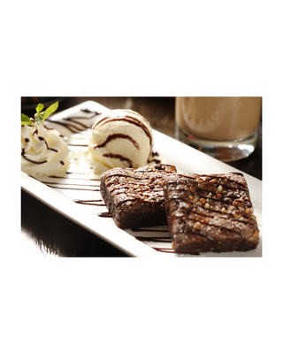 Gluten Free Fudgy Brownies with Vanilla Ice Cream, Whipped Cream and Chocolate Sauce