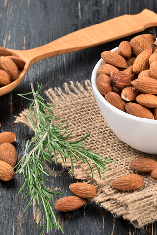 Bowl of Almonds and Rosemary Sprigs