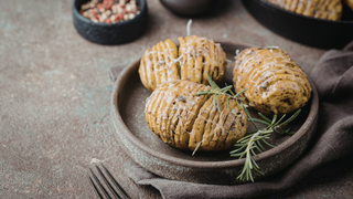 Hasselback Potatoes with Garlic Herb & Truffle Butter