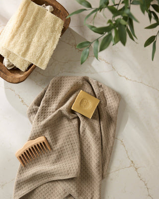 Geometry Latte Truffle Hand Towel from the 2302 TEA TOWELS collection, featuring a soft fabric with latte and truffle design patterns.