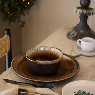 Mocha brown Costa Nova Poterie soup and cereal bowl from the 2201 dinnerware collection, showing a smooth glazed interior and rounded shape.