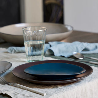 Costa Nova Stacked Organic Oval Plate from 2201 Dinnerware collection, showcasing a ceramic plate with an organic oval shape and textured finish.