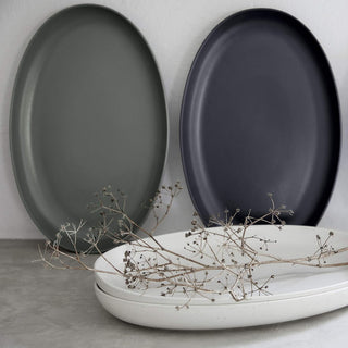Costa Nova Pacifica oval salt plate from the 2201 dinnerware collection, featuring a stylish salt dish with a textured design.