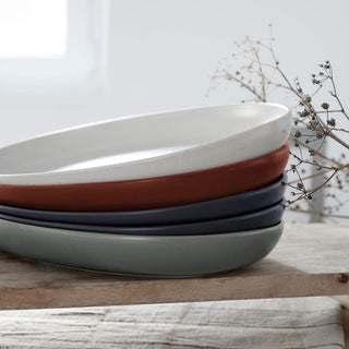 Costa Nova Pacifica oval salt plate from 2201 dinnerware collection, featuring a sleek white ceramic design.