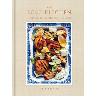Cover of The Lost Kitchen cookbook by Penguin Random House LLC, featuring a rustic design with the book's title and a cozy kitchen scene.