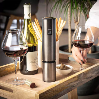Peugeot Elis Touch Rechargeable Electric Corkscrew with black handle and stainless steel spiral for opening wine bottles.