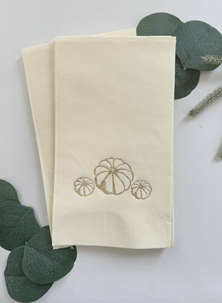 Set of 16 cream pumpkin fall Thanksgiving dinner napkins by EnFete, LLC, featuring festive pumpkin design for seasonal table settings.