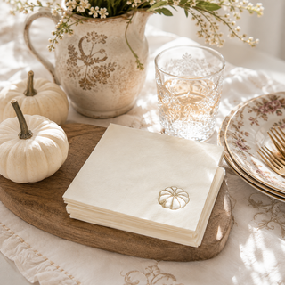 Cream pumpkin fall Thanksgiving luncheon napkins with pumpkin design from EnFete, LLC, suitable for autumn and holiday gatherings.