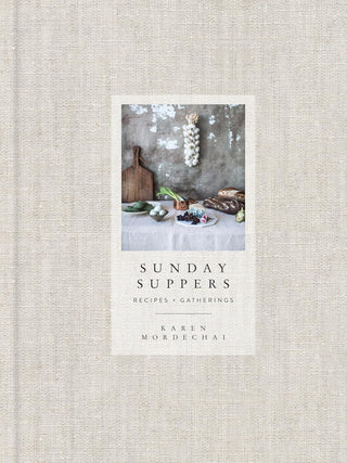 Cookbook titled Sunday Suppers by Penguin Random House LLC, featuring a colorful cover with images of prepared dishes.