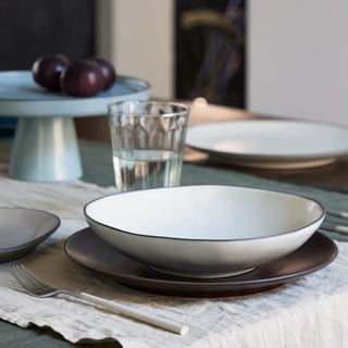 Stacked organic pasta bowl from Costa Nova 2201 dinnerware collection, featuring a modern, textured ceramic design.