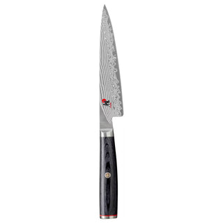 Miyabi Kaizen II 4.5-inch paring knife with stainless steel blade and ergonomic handle for precise kitchen prep.