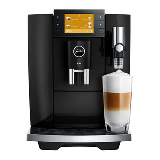 Jura E8 coffee machine in sleek piano black finish with a modern design and built-in coffee spout.