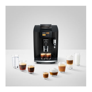 Jura E8 coffee machine in piano black finish with sleek design and digital display, perfect for home barista use.